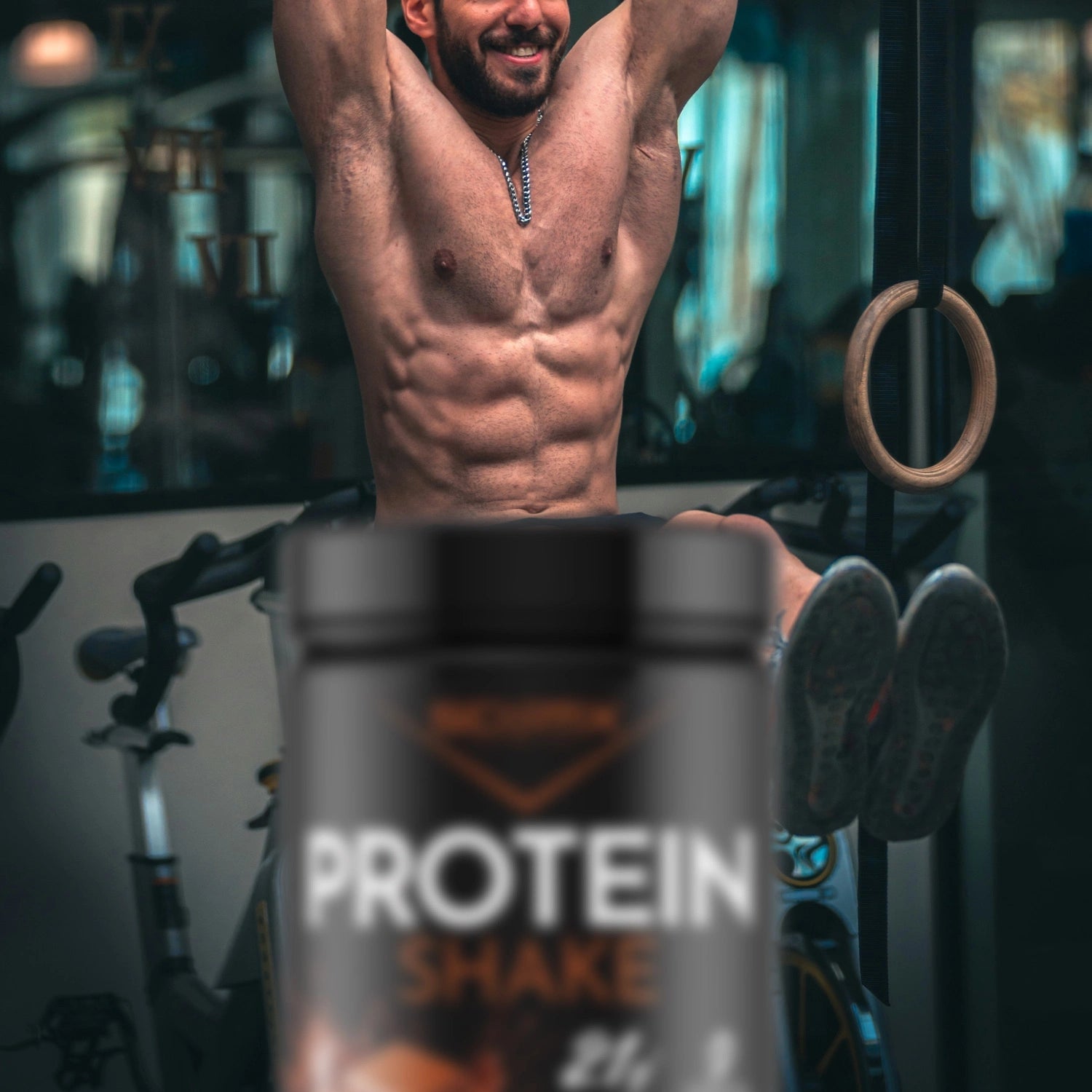 Man doing leg lifts with SCI-MX Protein Shake Chocolate in the foreground