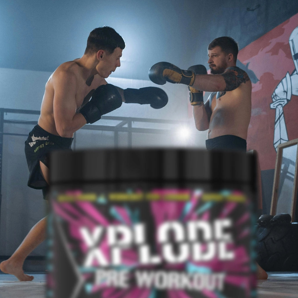 Two boxers in a boxing ring with a container of 'Vdine All Out Pre Workout' in the foreground.