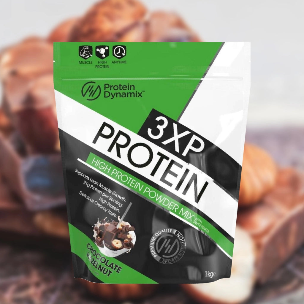 Protein Dynamix 3XP Protein package with blurred chocolate cookies in the background