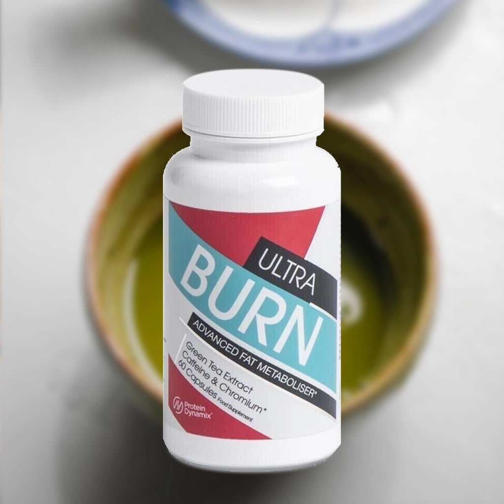 Bottle of Ultra Burn supplement with Green Tea Extract, Caffeine & Chromium with a blurred background of Green Tea