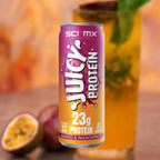 Sci-Mx Juicy Protein can with a glass of juice and passionfruit behind