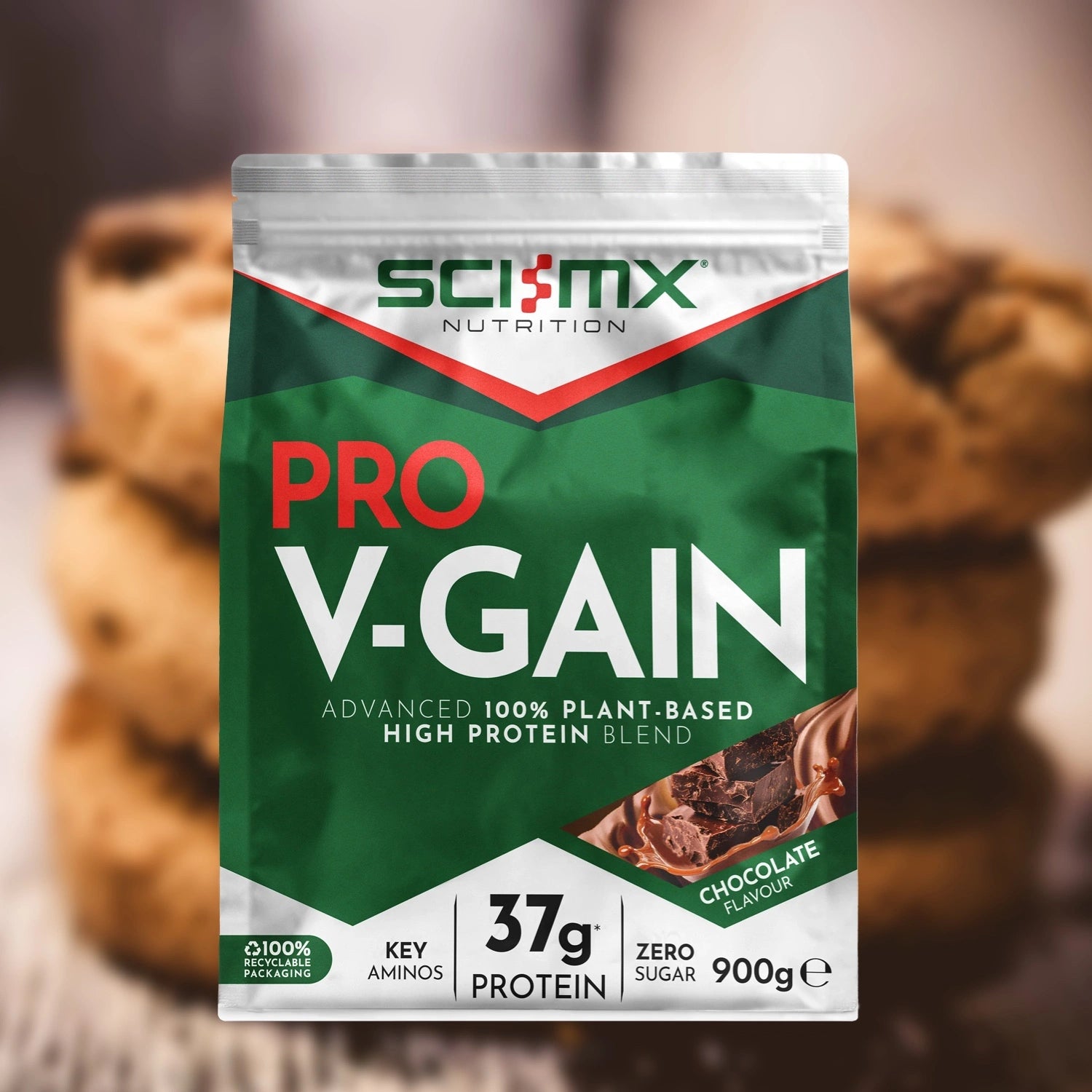 Sci-Mx Nutrition Pro V-Gain protein package with chocolate chip cookies in the background
