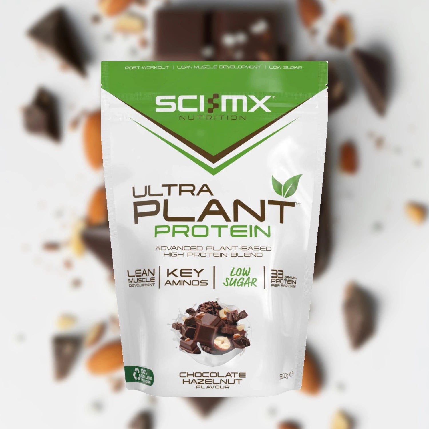 Chocolate Hazelnut Sci-Mx Ultra Plant Protein package with chocolate pieces in the background