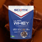 Sci-Mx Nutrition Ultra Whey protein package with chocolate flavour on a blurred chocolate image background
