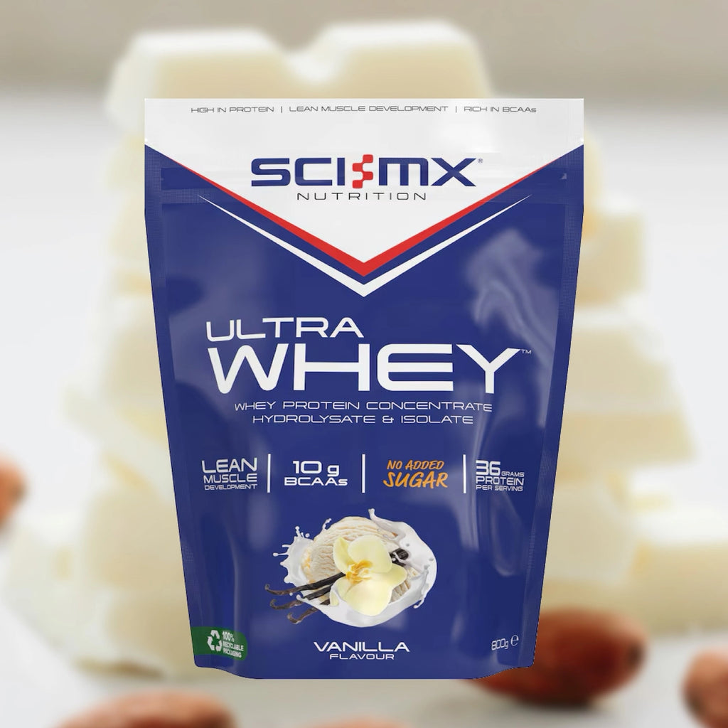 Sci-Mx Nutrition Ultra Whey protein package with vanilla flavour on a blurred vanilla background