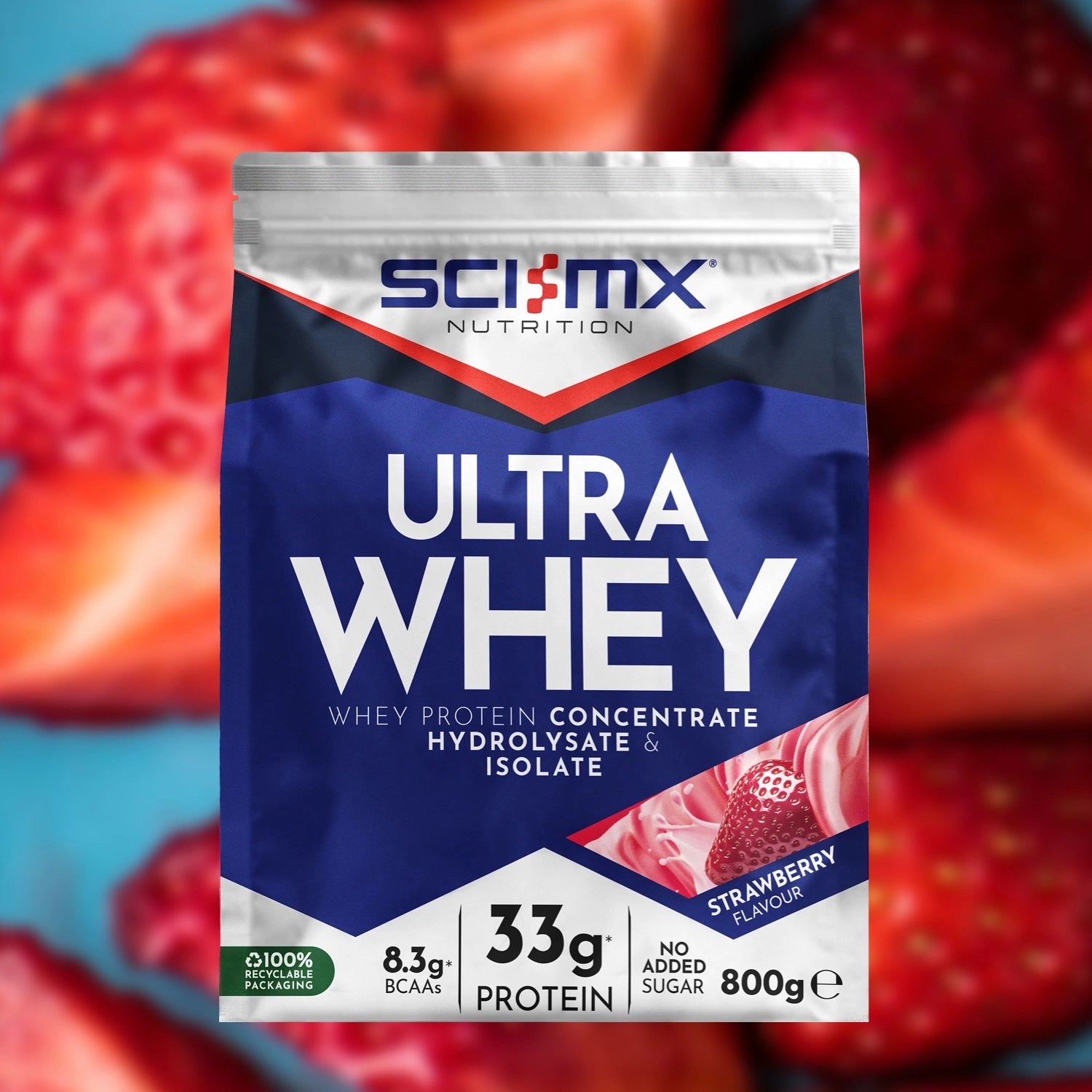 A bag of SCI-MX Nutrition Ultra Whey protein powder in strawberry flavor, shown in front of a blurred background of sliced strawberries.