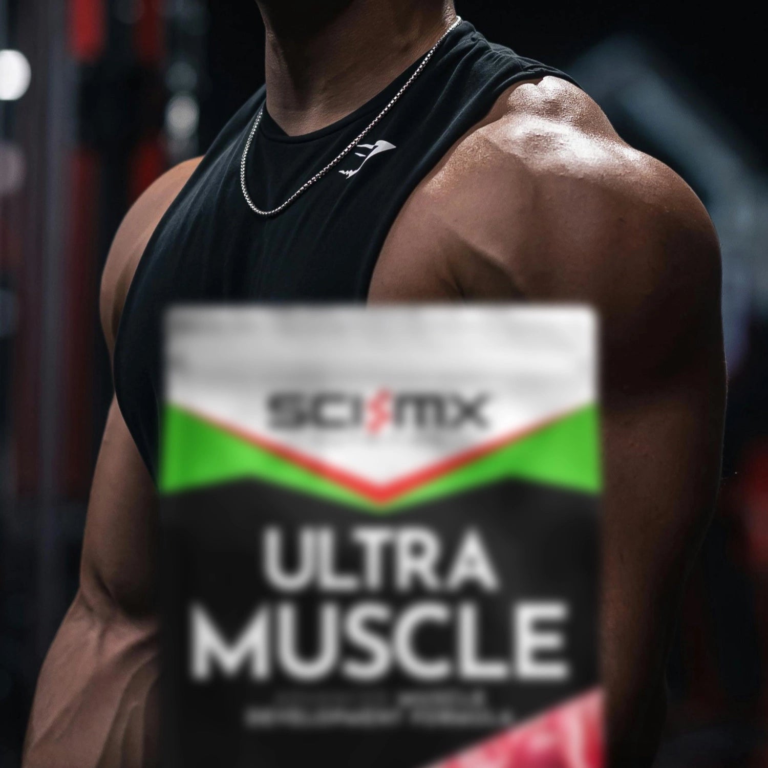 Person flexing muscles with Sci-MX Nutrition Ultra Muscle in chocolate flavour in foreground